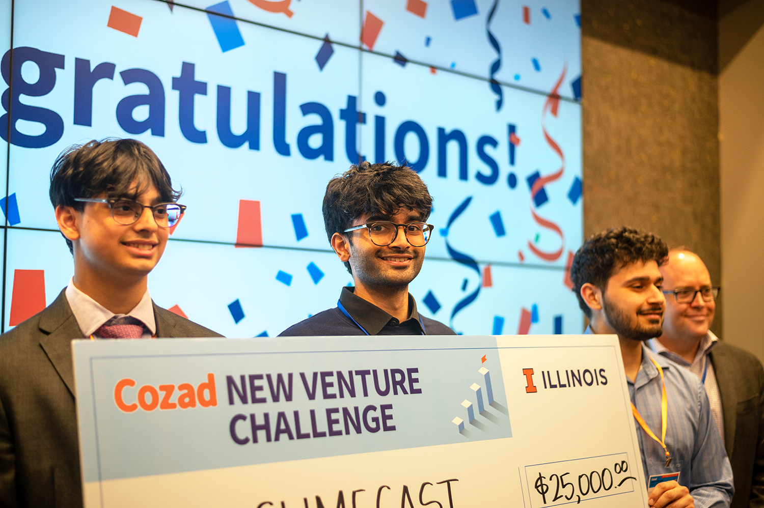 ClimeCast accepts the Third Place prize.